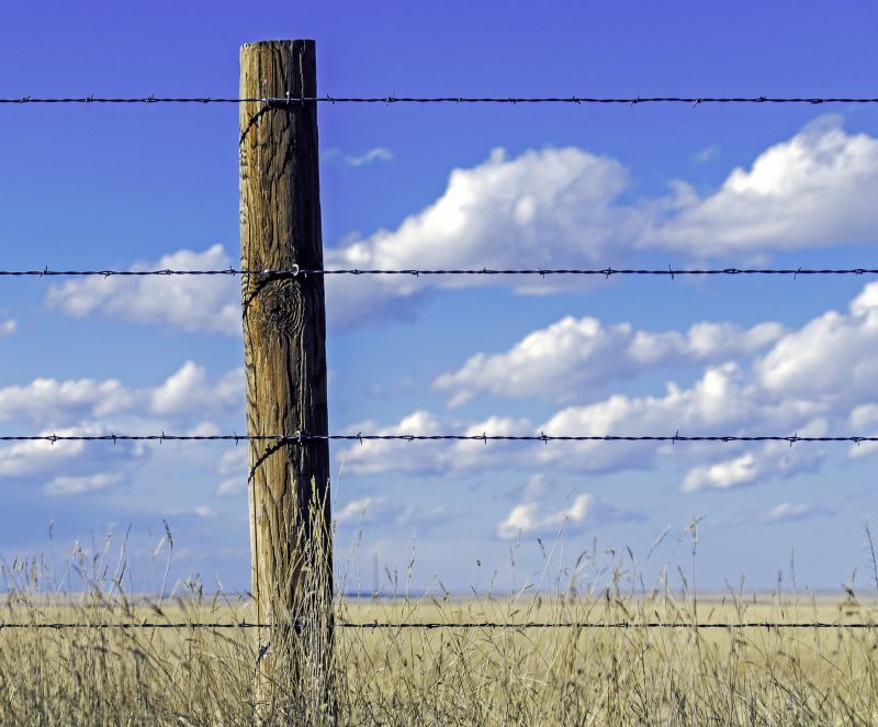 Barb Wire Fence Installation