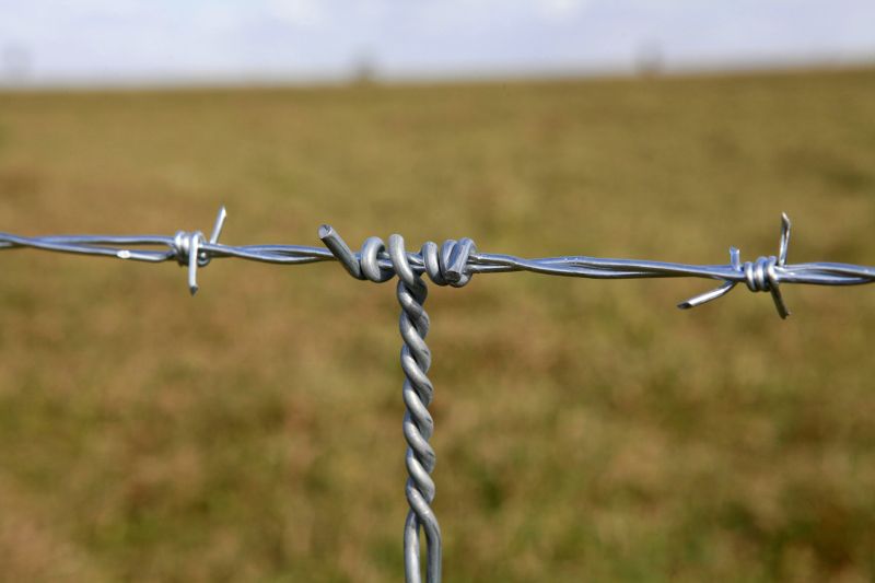 Barb Wire Fence Installation